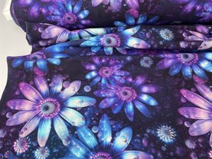 Bomuldsjersey - fortryllende blomster i lilla toner, gots